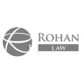 Rohan Law firm logo with stylized globe symbol, representing legal services expertise.